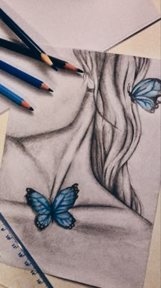 a pencil drawing of a woman's face with butterflies on it