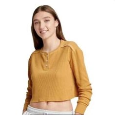 Nwt Wild Fable Wild Fable Mustard Yellow Crop Top Waffle Henley Long Sleeve Top Juniors Size: Small Slim Fit And Cropped Cut For On-Trend Silhouette, Long Sleeves Add Some Warmth & Texture Look, Cropped Length Creates Adds Interest, Cotton Blend Material Is Soft And Stretchy For Comfortable Wear, Solid-Colored , Pullover Style, 3 Front Button Patterned Options To Suit Your Aesthetics. Nwt Size: S (Small ) Womens /Juniors -Target Wild Fable Color: Mustard Yellow Material: 60% Cotton, 40% Polyeste Waffle Henley, Henley Long Sleeve, Yellow Crop Top, Wild Fable, Mustard Yellow, Red Yellow, Pullover Styling, Long Sleeve Top, Crop Tops Women