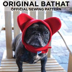 a small dog wearing a red hat on top of a wooden chair with the words, original bat official sewing pattern