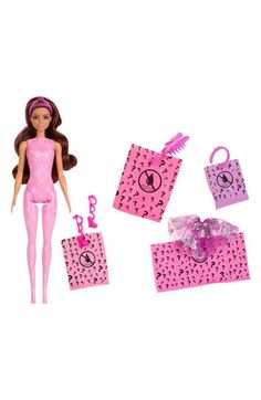 a barbie doll with pink clothes and accessories