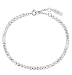 Elevate your style with our Silver Row Bezel Set Bracelet. The rows of sparkling silver are elegantly bezel set, creating a luxurious and sophisticated accessory. This bracelet is perfect for adding a touch of glamour to any outfit. Experience the beauty and quality of our premium bracelet. • Material: 925 Sterling Silver with Rhodium Plating with Cubic Zirconia• Bracelet length: 165mm with 20mm extender• Weight: 4.0g Bridal Pendant, Set Bracelet, Cubic Zirconia Bracelet, Bridal Engagement Rings, Bridal Bands, Engagement Ring Wedding Band, Bridal Earrings, Bezel Setting, Estate Jewelry