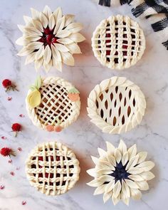 some fake flowers that are on top of a marble countertop with the caption above it