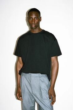 The perfect T-Shirt, handsomely tailored for an All-American 90s appeal. With slightly dropped shoulders, mid-bicep sleeve and a relaxed fit, this classic T drapes loosely over the body for an effortless ease. Not a typical, multi-pack T-shirt, the Eames is constructed from a super smooth, heavyweight supima cotton mad Streetwear Fits, Denim Accessories, A Typical, Fashion Designs, Supima Cotton, The Body, Sweatshirt Shirt, Photo Poses, Everyday Wear