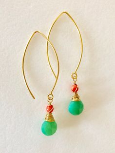 "Lovely Apple green faceted chrysoprase briolettes wire wrapped with Angel skin coral beads hang from 24k gold vermeil ear wires. High quality faceted heart briolettes are approximately 9-10 mm with luscious opalescent apple green color. Angel skin 4mm coral rounds are a pale orange pink. Gems are wire wrapped in 24k gold vermeil. Sweet dangle earrings are lightweight and measure 2 1/8\" long. Fun pop of color!" Green Briolette Earrings For Pierced Ears, Gold Chrysoprase Gemstone Earrings, Gold Chrysoprase Earrings As A Gift, Gold Chrysoprase Earrings For Gift, Handmade Elegant Chrysoprase Earrings, Elegant Handmade Chrysoprase Earrings, Handmade Green Briolette Earrings, Green Briolette Earrings For Gifts, Apple Green Color