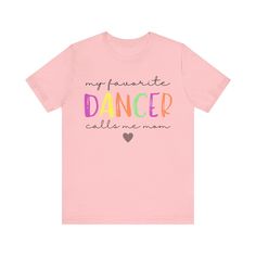 a pink t - shirt that says, my favorite dancer calls me mom on it