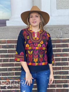 This beautiful Mexican Embroidered Blouse is perfect for any formal event or daily use! These blouses are hand embroidered by Mexican Artisans and completely one of a kind. Note: Model is wearing a M/L Traditional Fitted Blouse With Woven Motifs, Fitted Traditional Blouse With Woven Motifs, Traditional Fitted Embroidered Top With Embroidered Border, Fitted Traditional Embroidered Top With Embroidered Border, Fitted Traditional Embroidered Top, Embroidered Multicolor Long Sleeve Blouse Piece, Traditional Multicolor Embroidered Top, Multicolor Embroidered Long Sleeve Blouse Piece, Long Sleeve Embroidered Multicolor Blouse Piece