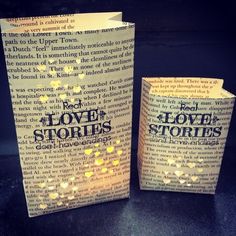 two paper bags with the words love stories printed on them, sitting next to each other