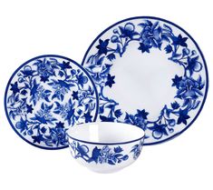 blue and white dinnerware set with floral design