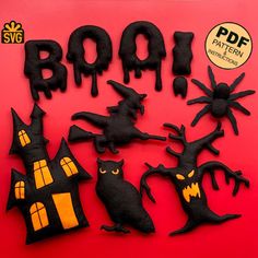 halloween decorations made out of felt on a red background