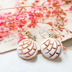 These one-of-a-kind Mexican Sweet Vanilla Clay Concha Earrings will make you the toast of any fiesta! Handmade and hand painted with realistic detail, each earring looks just like the traditional pan dulce from south of the border. Show off your Mexican heritage in style! DETAILS:Size about 0.75 inch diameter. They come in a beautiful and elegant gift box. Order Now! Limited Quantities/Limited Edition.Get them fast... ready to ship in one to three business days. Thank you for shopping with us! _ Traditional Hand Painted White Earrings, Traditional White Hand Painted Earrings, Traditional White Hand-painted Earrings, White Artisan Hand-painted Earrings, White Hand Painted Artisan Earrings, White Artisan Polymer Clay Jewelry, Earring Looks, Mexican Sweet Breads, Mexican Heritage