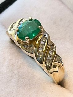 7 x 5mm. Oval Emerald Ring w/ Appraisal 14kt. Diamond Accents.  Please see the picture of the appraisal dated April 21, 2003 placing value at $500. Eighteen Years ago. (You have to magnify the page.)   A great value with a lot of style. Never pre-owned. Oval Emerald Ring, Holiday Gift Bag, Emerald Gem, Tsavorite Garnet, Gold Gift, April 21, Emerald Diamond, Emerald Ring, 14kt Gold