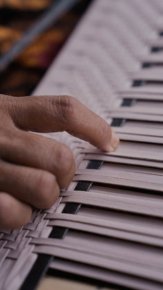 a close up of a person's hand on a keyboard