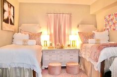 two twin beds in a bedroom with pink and white decor