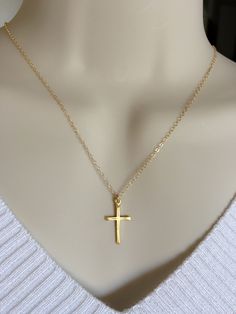 "Handmade with love! Delicate Cross necklace is great gift ideas for Mom, for your wife, for birthday, for Baptism, Christmas, Mother's day, gift for her, for mom, grandma, best friend, sister, daughter, bridesmaid gift.... MATERIALS: - Silver Plated chain and components. - Sterling silver Cross size 11.6mm x 20.6mm. - The model is wearing a 18\" inches necklace from end to end. - Gold Plated chain and components. - Gold Plated Cross. HOW TO ORDER: ** Please click on the drop down menu select ne Simple Cross Jewelry For Gifts, Cross Charm Necklaces For Mother's Day Gift, Mother's Day Gift Charm Necklaces With Cross Shape, Mother's Day Gift Cross Charm Necklace, Valentine's Day Wedding Cross Jewelry, Valentine's Day Cross Pendant Jewelry Gift, Valentine's Day Gift Cross Pendant Jewelry, Cross Necklaces For Birthday And Mother's Day, Cross Necklace For Birthday And Mother's Day