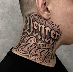 a man's neck with the word tattoo on it