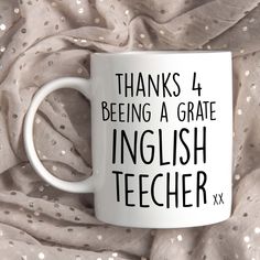 a white coffee mug that says thanks 4 being a grate english teacher xx on it