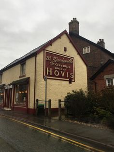 the outside of a building with a sign for hovis on it's side