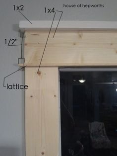 an unfinished window frame with measurements for the top and bottom section, including the height