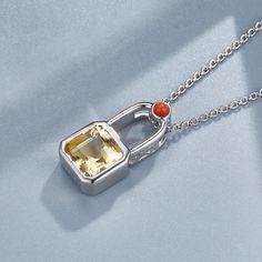 This Lock Necklace is set with the citrine and nanhong that symbolize wealth and good luck. Perfect for everyday wear, enhance your style and attract prosperity with this unique necklace. Material: 925 silver plated with platinum Gemstones: natural citrine, natural nanhong Pendant: 1.5*2cm Chain length: 45+5cm Lock Pendant, Lock Necklace, Natural Citrine, Unique Necklace, Unique Necklaces, Ring Bracelet, Earring Necklace, Chain Lengths, Chain Length