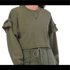 Gorgeous Olive Color. Relaxed Oversized Crop Fit. Length Of Shirt Is App 18” From Top Of Shoulder To Bottom. Size M Oversized Cotton Tops With Ruffles, Oversized Cotton Ruffled Tops, Spring Cotton Sweatshirt With Ruffles, Oversized Ruffled Cotton Tops, Casual Long Sleeve Ruffle Sweatshirt, Casual Long Sleeve Ruffled Sweatshirt, Spring Cotton Ruffle Sweatshirt, Spring Cotton Ruffled Sweatshirt, Fall Ruffle Top With Relaxed Fit