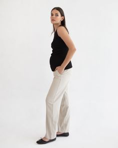 Mid rise elastic waistband Wide leg silhouette Side pockets Inseam length: 78cm Chic, classic and comfortable, our Soho Straight Pant is the perfect addition to your workwear wardrobe. Designed in a soft & crease resistant fabric and with our signature elastic waistband that sits at a comfortable midrise with or without a belly, they feature side pockets and are available in classic black and beige. Ideal for the office or wear them with an oversized knit and sneakers for a cool weekend look. PLEASE NOTE: Soon Maternity sizing is generous to ensure it lasts the duration of your pregnancy and beyond. We recommend purchasing your pre-pregnancy size. Workwear Wardrobe, Pre Pregnancy, Black And Beige, Straight Pants, Soho, New Day, Classic Black, The Office, Mid Rise