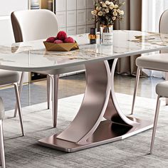 a marble dining table with chairs around it