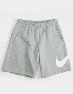 Nike Sportswear Club Sweat Shorts. The Nike Sportswear Club Shorts Blend Classic Comfort With A Bold Graphic For Street-Ready Style. Crafted From Soft Fleece, They've Got You Covered For All-Day Wear. Graphic On Left Leg. Elastic Waistband. Side Pockets. Approx. Inseam: 9". 80% Cotton 20% Polyester . Machine Wash. Imported. Gray Sweat Shorts, Nike Shorts Outfit, Cozy Outfit Ideas, Nike Sweat Shorts, Sweatpant Shorts, Grey Sweat Shorts, Grey Nike Shorts, Mens Sweat Shorts, Graphic Shorts