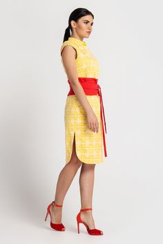 "A midi modern qipao dress featiring a high neck collar, - Modern cheongsam style - Mandarin neck with qipao closure (imitation) - Semi-Fitted pencil silhouette - Knee length (midi) - Sap sleeves - Side slits - Conceale back zipper closure - Wide red fabric belt included - Color: yellow & white jacquard - Fiber: cotton - 95%, elastane - 5% You may feel free choosing the size. Just send us your measurements (bust, waist, hips, height). For Size S: dress length - 40\" (102 cm) Our model wears Spring Formal Knee-length Cheongsam, Summer Formal Cheongsam With Stand Collar, Fitted Summer Dresses With Stand Collar, Fitted Knee-length Cheongsam For Party, Fitted Midi Dress With Stand Collar, Summer Party Cheongsam With Stand Collar, Knee-length Fitted Ao Dai For Parties, Fitted Ao Dai For Formal Summer Events, Modern Qipao Dress