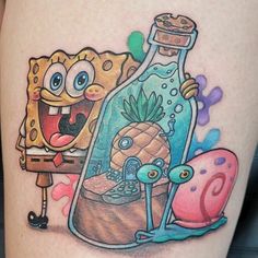 a cartoon character with a pineapple in a bottle tattoo on the thigh, next to an octopus and spongebob