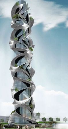 a tall tower with many spirals on it's sides and trees growing out of the top