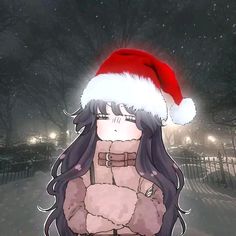 a girl with long hair wearing a santa hat and holding her hands on her hips