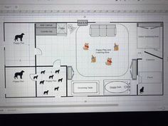 a computer screen showing a floor plan for a dog grooming shop with dogs on it