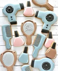 decorated cookies with hair dryers and combs on top of each cookie, which reads sale