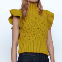 Zara Sweater Vest. Excellent Condition - Never Worn. Color - Ochre. Chic Yellow Winter Top, Yellow Cable Knit Top For Fall, Fall Yellow Cable Knit Top, Casual Knit Sweater With Ruffles, Casual Yellow Cable Knit Sweater, Casual Winter Sweater With Ruffles, Casual Yellow Textured Knit Sweater, Fitted Yellow Knitted Sweater, Casual Yellow Chunky Knit Top