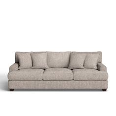 an image of a couch with pillows on it