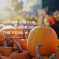 a bunch of pumpkins sitting on top of each other with a quote about october is the treasures of the year