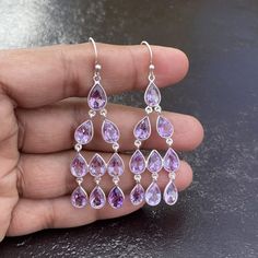 Chandelier Earring- Purple Amethyst Earrings- Handmade Jewelry- Statement Earrings- Dangle Earrings- Purple Earring- Gift For Her- Earrings Earrings Detail Gemstone ------------------------ Amethyst  ( Natural ) Colors ------------------------------ Purple Shape ----------- ------------------ Pear Gems Type ------------------------ Natural Closure ----------------------------- Hook Material ----------------------------- 925 Sterling Silver Quantity ---------------------------- 1 Pair Bezel Set D Teardrop Amethyst Chandelier Earrings For Jewelry Making, Purple Teardrop Chandelier Earrings As Gift, Gemstone Drop Chandelier Earrings, Silver Gemstone Chandelier Drop Earrings, Lavender Drop Earrings, Silver Gemstone Drop Chandelier Earrings, Purple Sterling Silver Drop Crystal Earrings, Purple Gemstone Chandelier Drop Earrings, Lavender Drop Gemstone Earrings