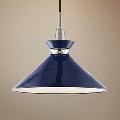 a blue pendant light hanging from a ceiling