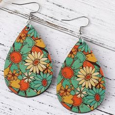 Eye-Catching Design: Elegant Flower Print Teardrop Earrings That Will Make You Stand Out From The Crowd. High-Quality Material: Made Of Durable And Hypoallergenic Alloy, Safe For Sensitive Skin. Earrings Are Made Of Wood. Easy To Wear: Lightweight And Comfortable To Wear All Day Long. Measurements In Photos. Smoke Free And Dog Friendly Home. Thanks For Looking And Have A Blessed Day. Floral Jewelry, Boho Jewelry, Leopard Print Jewelry, Gift For Her, Fashion Jewelry, Costume Jewelry, Faux Leather, Stocking Stuffer, Easter, Mother's Day, Gift Basket Filler. Teal Sunflower, Leather Stocking, Dangle Earrings Boho, Sunflower Decor, Printed Jewelry, Sunflower Pattern, Party Earrings, Birthday Gifts For Boyfriend, Drop Dangle Earrings