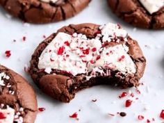 chocolate cookies with white frosting and crumbled on top