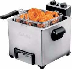 a deep fryer with some fried food in it