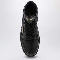 Black leather low top trainer from Prada featuring round toe, perforated upper, lace-up fastening, contrasting lettering logo print on tongue, enamelled metal logo triangle detail on side, leather heel with contrasting lettering logo and rubber sole. Size Type: ITMaterial: LeatherSKU: 1E792MDD303LPH/P_PRADA-F0002_500 Our Products Are 100% Genuine. In All Cases We Stand By The Authenticity Of Every Product Sold On Our Site. Logo Triangle, Fendi Shoes Sneakers, Lettering Logo, Fendi Shoes, Sneakers Women, Louis Vuitton Shoulder Bag, Metal Logo, Metallic Logo, Leather Heels