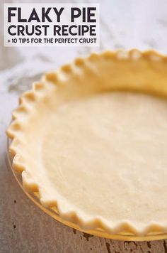 an uncooked pie crust sitting on top of a table with the words flaky pie crust recipe below it