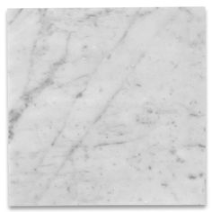 a white marble tile that looks like it is being used as a wallpaper or floor covering