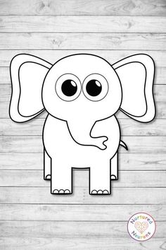 an elephant cut out on a wooden background