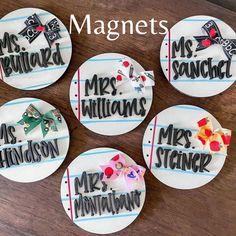 four magnets with the words mr and mrs written on them in different font styles