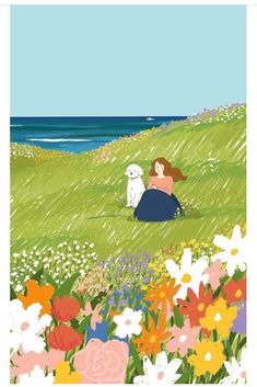 a woman sitting on top of a lush green field next to the ocean with a dog