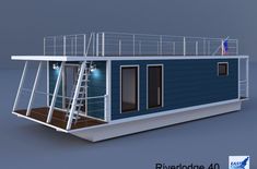 a blue houseboat with stairs to the upper deck and lights on it's side