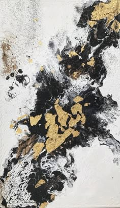 an abstract painting with black and gold paint