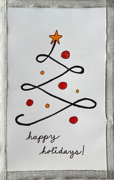 a card with a christmas tree drawn on it